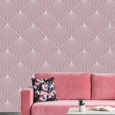The living room features a **geometric-patterned wallpaper** designed with various shades of **pink**, offering a modern and chic backdrop.