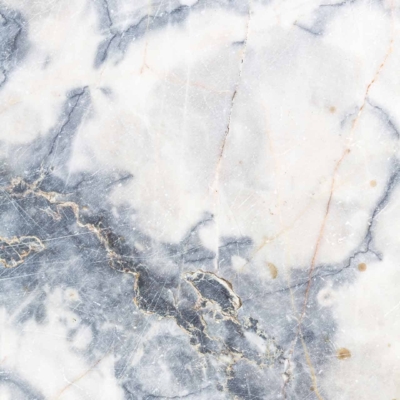 High-resolution image of a marble surface with a blend of white, grey, and beige tones. Features intricate veining patterns, natural cracks, and subtle color variations typical of polished marble. Ideal for showcasing timeless elegance.