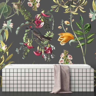 The wallpaper, inspired by the World of Birds, showcases a lush botanical theme with detailed illustrations of flowers, birds, and foliage. Colors found include rich greens from the foliage, vibrant reds and pinks from the flowers, and varied hues in bird plumage like blues, yellows, and browns.