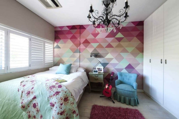 Colorful geometric wallpaper featuring vibrant patterns in multiple shades. Ideal for portfolios.