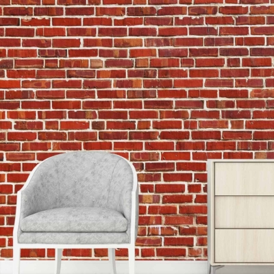 The red brick wall backdrop, serving as a wallpaper, highlights warm reddish-brown tones with natural texture and rugged patterns.