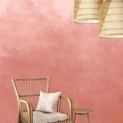 The wallpaper is a pink textured design, creating a soft and serene backdrop. The subtle texture provides depth and warmth to the space, complementing the minimalist aesthetic.