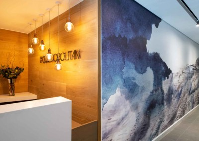 Abstract mural in shades of blue and gray, artistic touch.