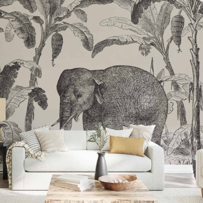 The wallpaper features an intricate mural of an elephant sketched among lush banana trees. Graceful swallows fly across the scene, adding a whimsical touch. The colors include shades of gray for the elephant, rich greens for the banana leaves, and soft blues for the swallows.