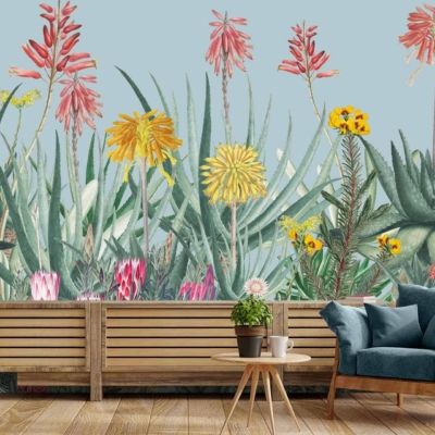 Vibrant mural featuring large, colorful flowers and lush green leaves. The wallpaper includes bold hues like red, yellow, blue, pink, and varying shades of green. It creates a lively and natural ambiance perfect for relaxation.