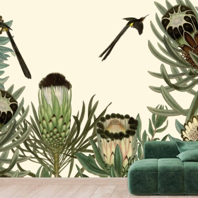 The wallpaper features a mural with large, stylized botanical illustrations including flowers like protea and plants with succulent-like leaves. It includes rich, earthy tones alongside pops of vibrant color. Two small sugarbirds add to the lively feel of the mural.