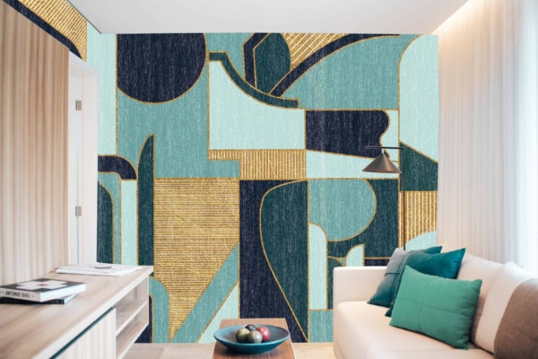 A modern living room showcases an abstract, geometric wallpaper adorned with shades of blue, green, and gold.