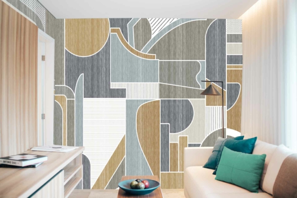 Abstract geometric patterned accent wall in shades of grey, beige, and white.