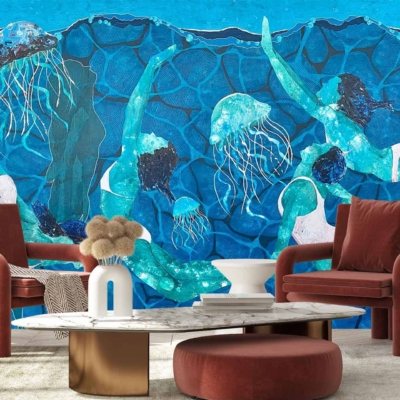 The wallpaper features a vibrant blue backdrop with dynamic elements, including swimmers and jellyfish. The aquatic scene is rich in oceanic hues and highlights the fluid movement of underwater life.