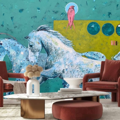 A modern living room boasts a large, colorful wall mural featuring abstract elements. The wallpaper depicts two abstract horses in vibrant hues alongside a striking pink bird.