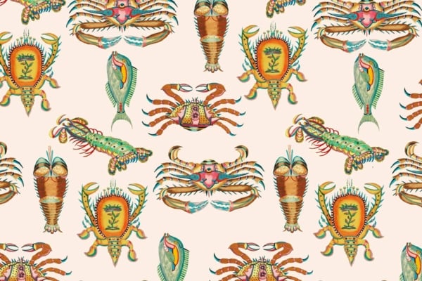 A playful, intricate wallpaper features colorful sea creatures like crabs, lobsters, fish, and seashells in a repeating design on a beige background. The whimsical marine-themed illustrations add vibrant touches of red, blue, green, and orange. Ideal for those seeking an underwater wonderland decor.