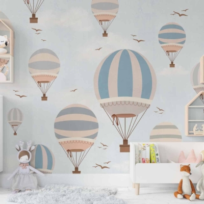 The whimsical children's room wallpaper features playful hot air balloons in pastel shades of blue, pink, and yellow, soaring alongside charming birds with colorful feathers. The backdrop is a soft sky blue with fluffy white clouds scattered throughout. This vibrant yet serene design captures the adventurous spirit of *80 Days*.