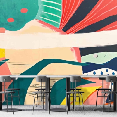 A vibrant, abstract mural in Sadie's unique artistic style features bold colors including red, green, yellow, and blue. The mural consists of organic shapes and patterns creating a lively background.