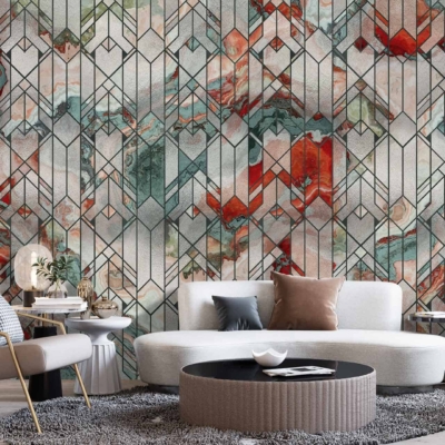 The wallpaper in the modern living room showcases a striking geometric pattern in vibrant shades of red, green, and white.