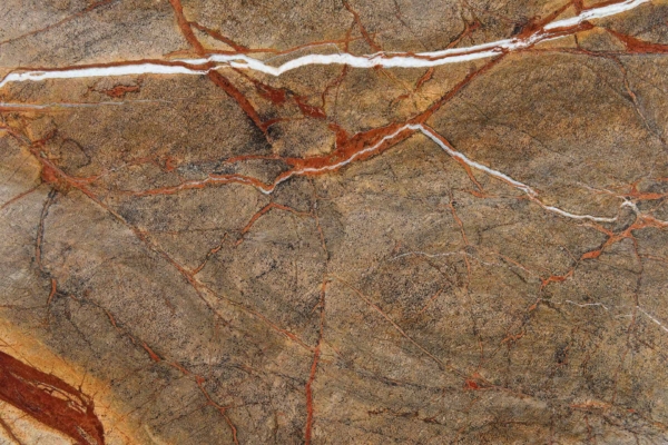 A polished stone wallpaper boasts a network of brown, red, and white natural cracks and veins. The intricate patterns resemble Brazilian leaves, adding a visually striking and textured effect.