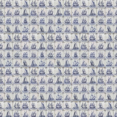 A wallpaper grid featuring small, intricate illustrations of various sailing ships in blue and white. Each vessel has detailed tall masts and sails, arranged in neat rows and columns. The light background incorporates an essence of African design elements. Key features: