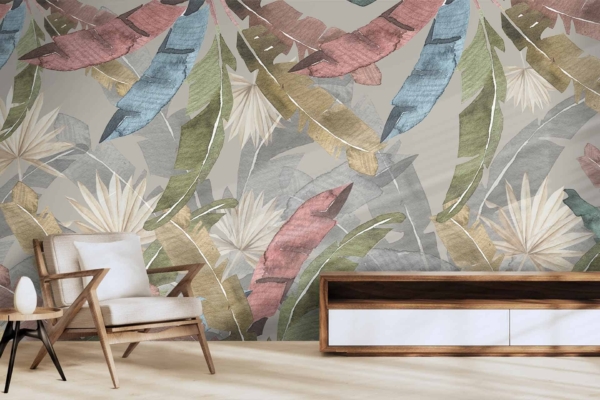 The back wall features a large mural with a colorful leaf-patterned design, showcasing shades of green, blue, pink, and beige. The mural evokes a fantastical journey into a tropical atmosphere.