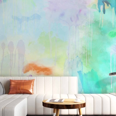 Bright, colorful abstract watercolor-style wall mural with splashes of blue, green, and orange. Vibrant hues bring joy to the space.