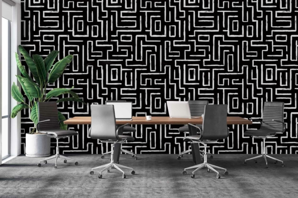 The back wall features a bold black and white geometric pattern. Black lines intersect sharply with white spaces, creating an eye-catching and modern contrast. The striking angles and clean lines in this monochromatic design make the wallpaper an unforgettable focal point in the room.