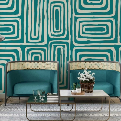 A stylish living room features *teal and beige geometric wallpaper*.