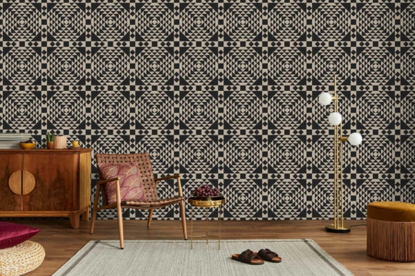 Dark patterned wall with intricate designs and deep hues.