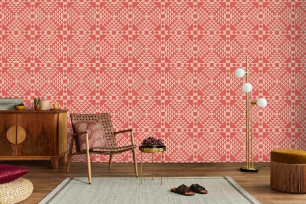 The living room features a vibrant red geometric patterned wallpaper. This striking design showcases bold reds, complemented by intricate geometric shapes, creating a dynamic and eye-catching background. With rich shades of red interwoven into the pattern, this wallpaper adds warmth and energy to the space.