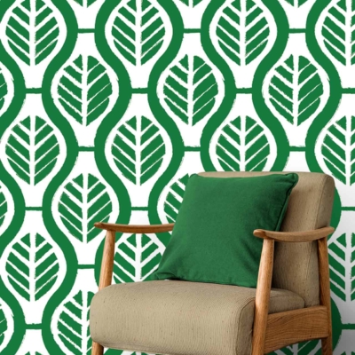 Green leaf pattern on white wall.