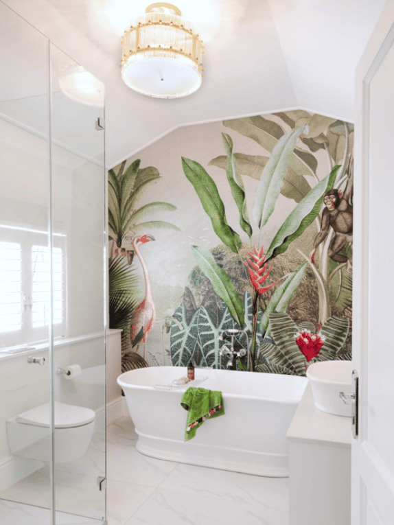 Botanical wallpaper in a white bathroom.