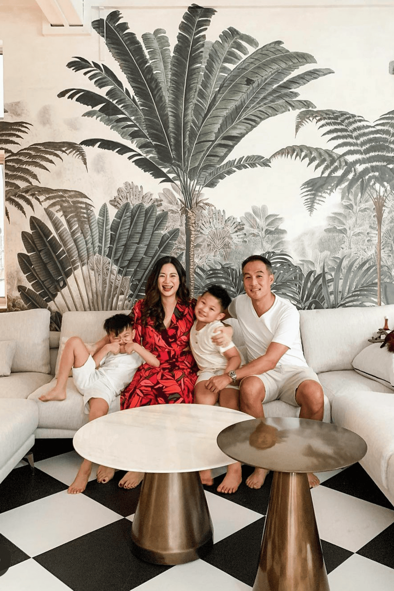 Living Room - A New Dawn The wallpaper features black-and-white palm tree patterns.
