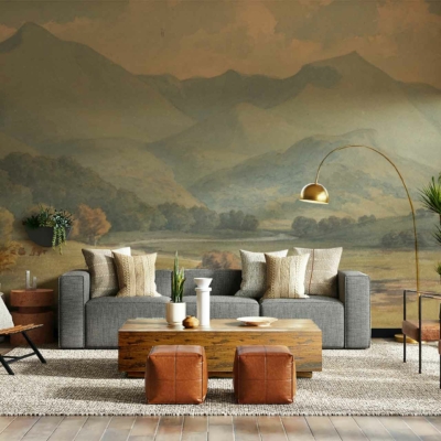 The mountain mural wall is the standout feature of this stylish living room, embodying the 