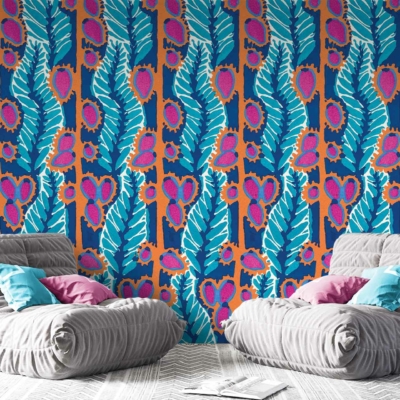 Vibrant wall featuring a bold, leafy pattern in blue, green, and magenta.
