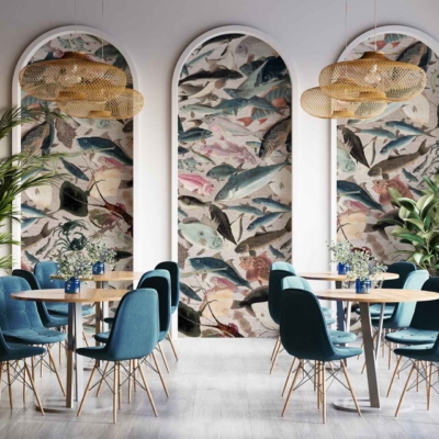 Vibrant fish-themed artwork panels; white framing arches; colorful aquatic designs with hues of blue, teal, orange, and yellow.