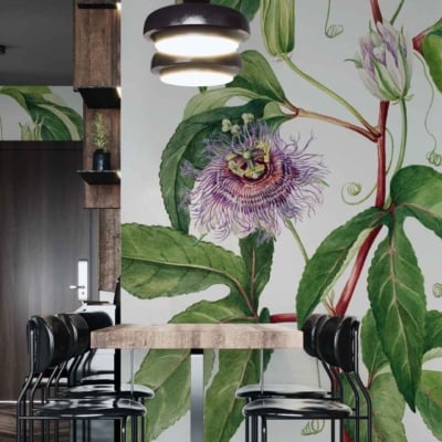 A large botanical mural featuring vibrant green leaves and a purple passionflower decorates the wall, embodying a sense of self-love.