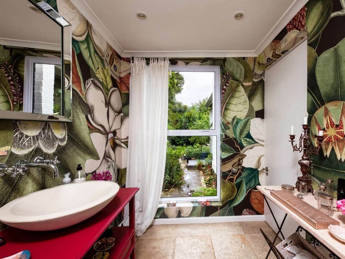 Luxury botanical wallpaper in a home with a small amount of space, the wallpaper enlarges the appearance