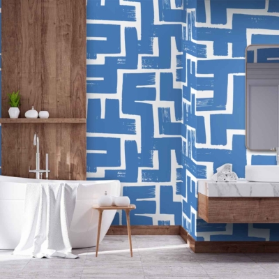 The bathroom showcases a bold blue and white geometric pattern wallpaper by The Painter, featuring striking interconnected shapes and clean lines. The vibrant blue contrasts sharply with the crisp white, creating a visually dynamic backdrop that catches the eye. The geometric elements evoke modernity and sophistication, blending seamlessly with the contemporary design of the space. This wallpaper serves as an exquisite focal point, integrating hues of azure and ivory in an unforgettably stylish manner.
