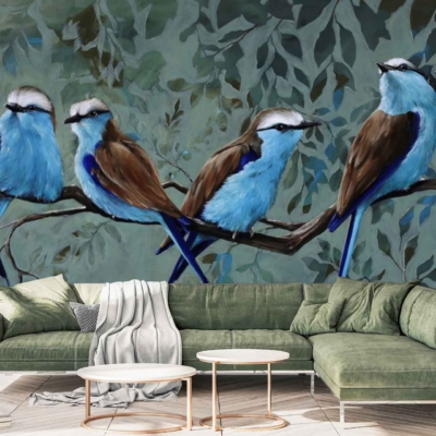 Wall mural featuring blue and brown birds perched on branches with a leafy background. Colors include shades of blue, brown, green, and natural wood tones. The design is nature-inspired, bringing an essence of tranquility through detailed depictions of birds and foliage.