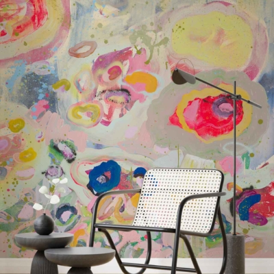 The wallpaper features a colorful abstract mural with swirling, vibrant patterns reminiscent of a dance performance. Dominant colors include bold reds, deep blues, bright yellows, and rich greens interwoven in fluid, dynamic shapes. Touches of purple and orange add depth and energy to the design. The patterns create a sense of movement and rhythm across the wall. Key elements are swirls, curves, and interlaced hues creating an eye-catching focal point that embodies motion and vibrancy.