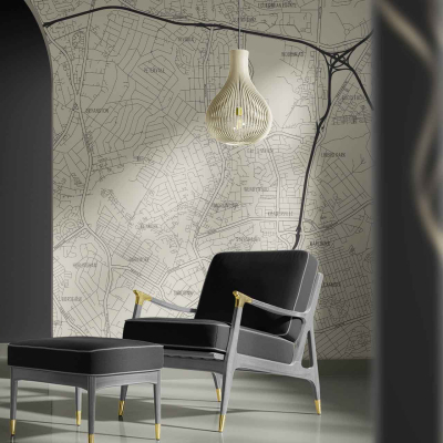 The wallpaper features a detailed map design with intricate lines and patterns. Its color palette primarily includes muted tones like beige, gold, and subtle hints of grey. This decor element exudes an elegant yet urban vibe in the north-facing space.