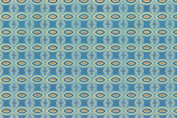 Stylized peacock feathers wallpaper: Features eye-like shapes with bright orange centers, yellow and blue feather motifs on a light blue background. Symmetrical and vibrant design. Colors include blue, yellow, orange, and light blue.