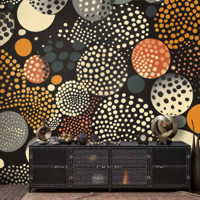 The living room features a striking black wall decorated with overlapping circles in various sizes, all in earthy tones. The circles encompass hues of orange, beige, and gray, creating a dynamic yet harmonious pattern. This stylish wallpaper serves as a bold backdrop while adding warmth and texture through its layered design.