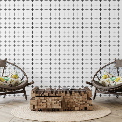 The wallpaper features a geometric pattern with interlocking hexagons and triangles. The design showcases shades of soft gray, muted blue, and warm beige. Thin metallic gold lines accentuate the shapes, adding a subtle touch of elegance to the modern living room.