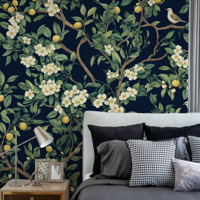 A stylish bedroom featuring a dark floral and lemon wallpaper reminiscent of an Olive Grove. This lush wallpaper showcases intricate patterns of olive branches with deep green leaves, vibrant yellow lemons, and delicate white blossoms on a rich, dark background.