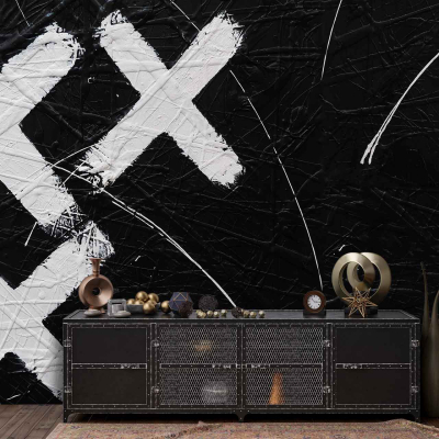 Black wall with large white Xs and abstract white lines.