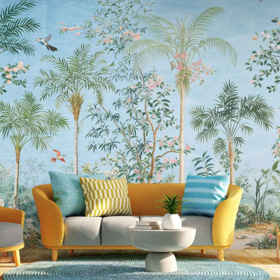 The wall mural showcases a tropical theme with lush green palm trees and vibrant colorful birds, such as parrots and toucans, against a clear blue sky. The scene is filled with lively hues of emerald, azure, and vivid splashes of red, yellow, and orange from the birds' plumage, creating an energizing focal point.