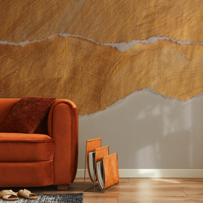 Textured golden abstract artwork on the wall; features gold tones with dynamic, textured patterns.
