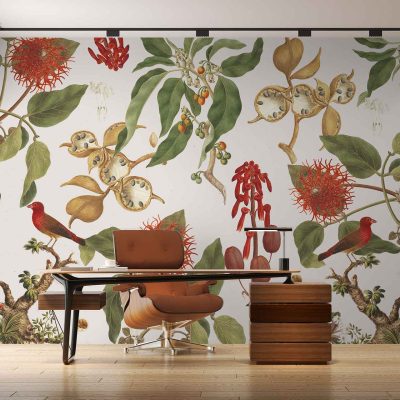 The wallpaper features a large, colorful botanical mural with vibrant leaves, diverse flowers, and various birds. The elements include lush green foliage, blooming flowers in shades of pink, yellow, and red, as well as detailed illustrations of birds in blues and oranges. This vibrant design creates an eye-catching contrast against the wooden floor and fills the room with a lively atmosphere.