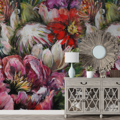 A vibrant floral mural with red, pink, and green hues.