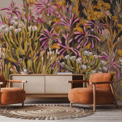 The wallpaper features a vibrant floral mural with bold pink, yellow, and green hues. Large flowers and leafy patterns create an eye-catching, colorful backdrop.