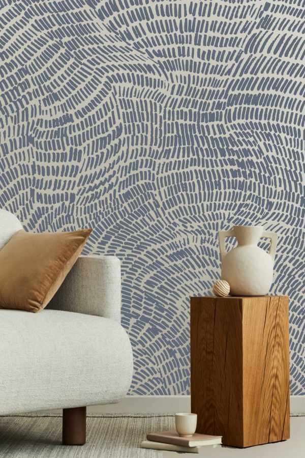 Textured blue and beige patterned wallpaper, reminiscent of a Whispering Meadow. Features subtle meadow-like designs with hints of natural elements. Predominantly blue and beige hues.