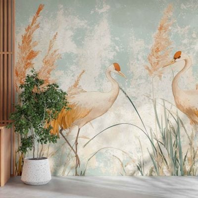 Wallpaper features: two elegant cranes, tall grasses, reeds, gentle breeze effect; softly textured background in pastel colors (soft blues, blush pinks, gentle greens); graceful bird silhouettes; subtle botanical elements.